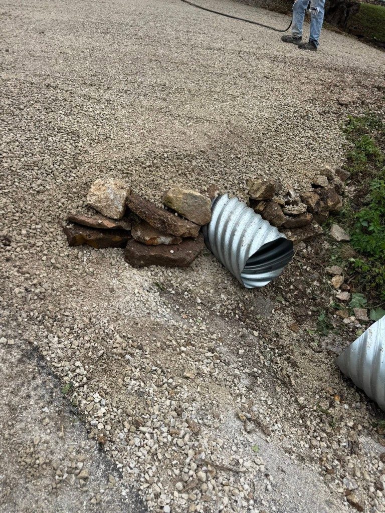 Dump truck loaded with material and debris for haul-off